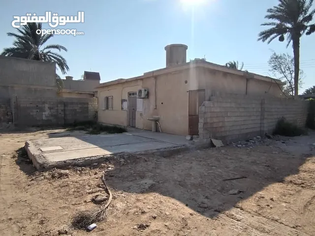 عقار أرض بها منزل قديم للبيع - مصراتة - كرزاز- بالقرب من 4 شوارع كرزاز الساحلي -1657م2