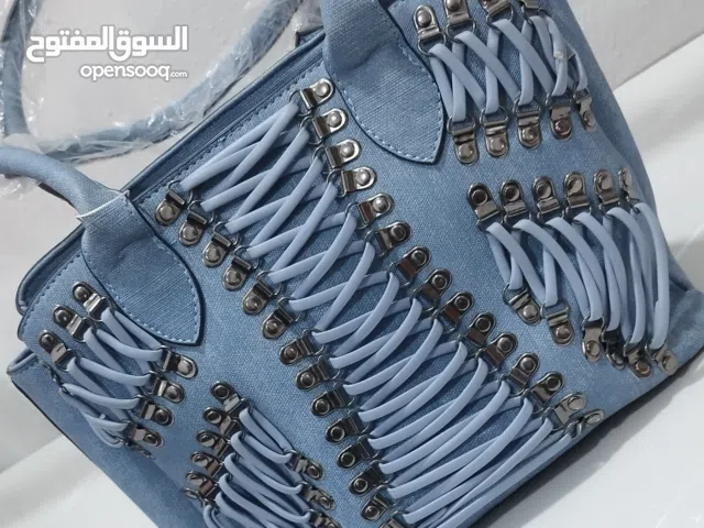 حقاىب وربطات نسائيه