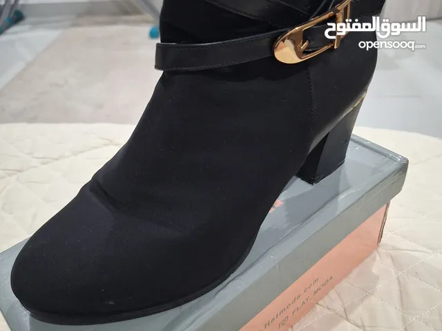 Black Boots in Hawally