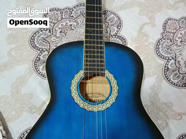 جيتار كلاسيكي نوعية سوزوكي SUZUKI للبيع او البدل بعود