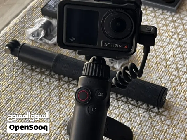 DJI Osmo Action 4 Adventure Combo  مع عدسات و استاند احترافي من دي جي اي و شنطة الكاميرا