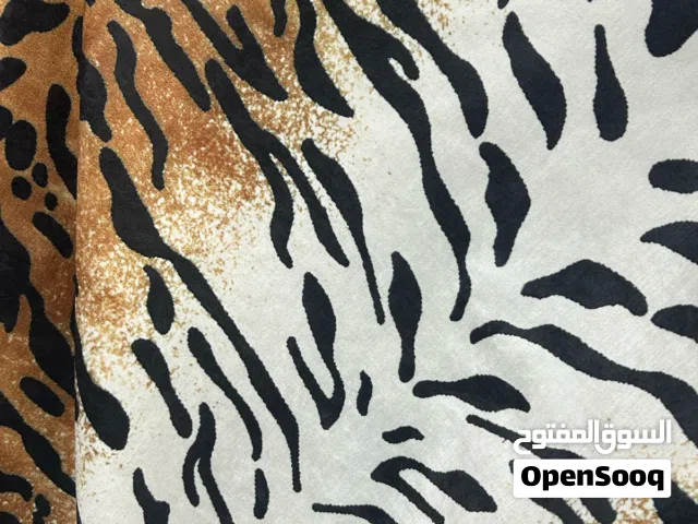 أقمشة التايجر بتصميمات ملفتة للنظر تمتاز بمتانتها لتنجيد الكنب والكوشن بعدة ألوان مختلفة