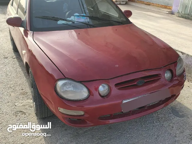 كيا شوما نضيفه موديل 1998 لون احمر ناري نظيفه السياره انا بايع بدون فحص