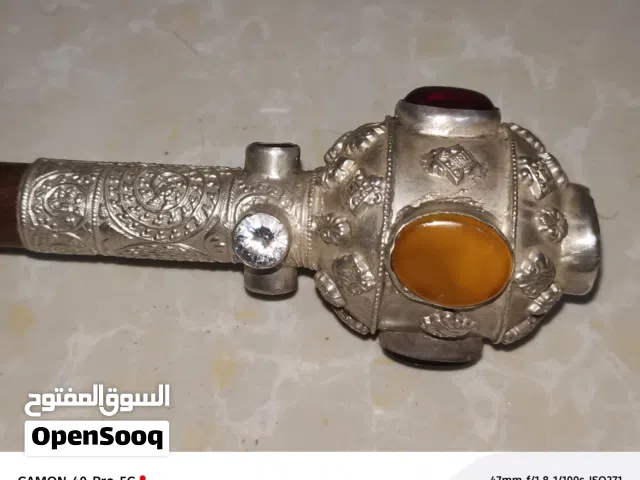 عصا متروسه بالفضه و الاحجار الكريمه