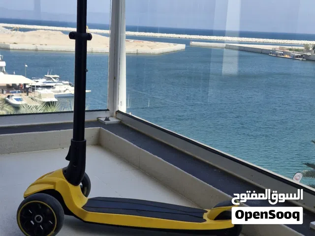 2 scooters and a stroller board