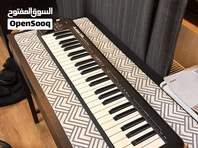 Alesis Q49 midi keyboard