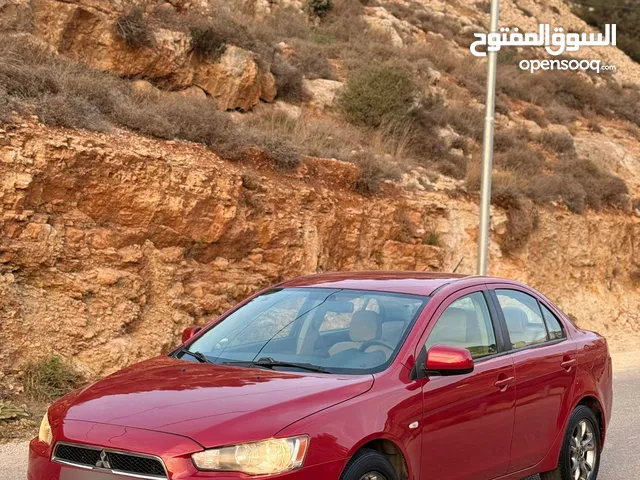 لانسر 2010.اصل خصوصي.بحاله ممتازه .فحص نضيف .اتماتيك .بنزين .رام لله او الخليل