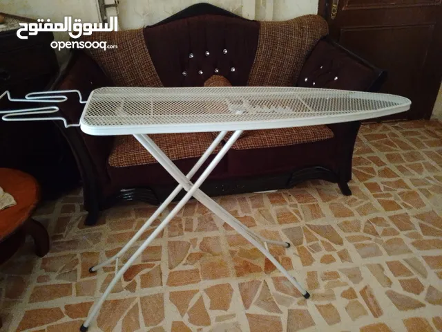 طاوله كي ملابس
