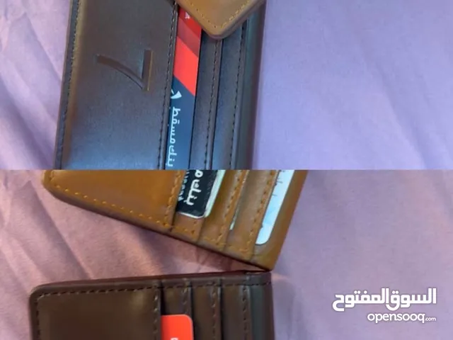 محافظ جلديه جميله وانيقه