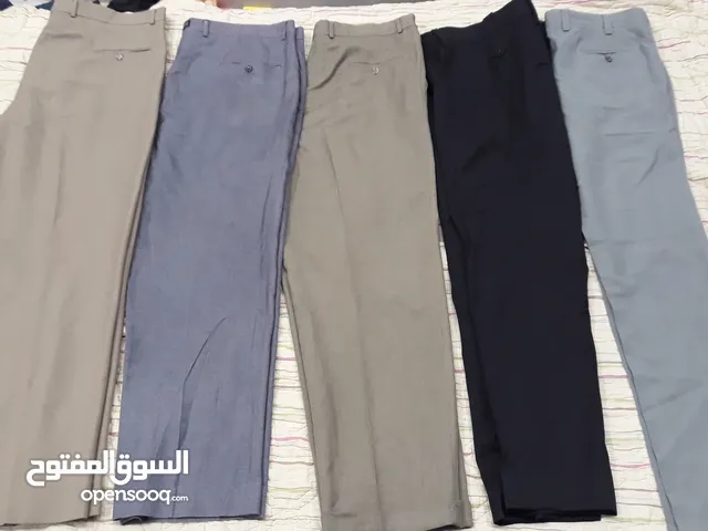 بناطيل رجالى مستعملة على ربع دينار الواحد
