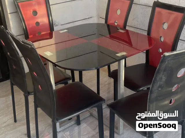 طاولة طعام سيكوريت مستعملة بحالة جيدة