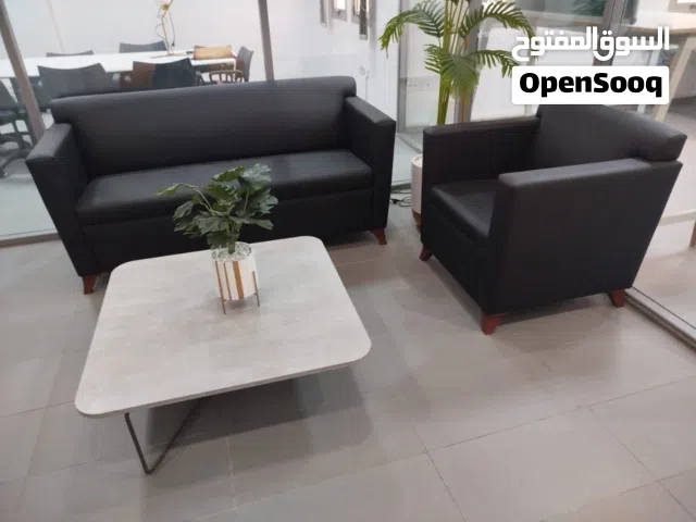 Ensemble de salon noir en très bon état