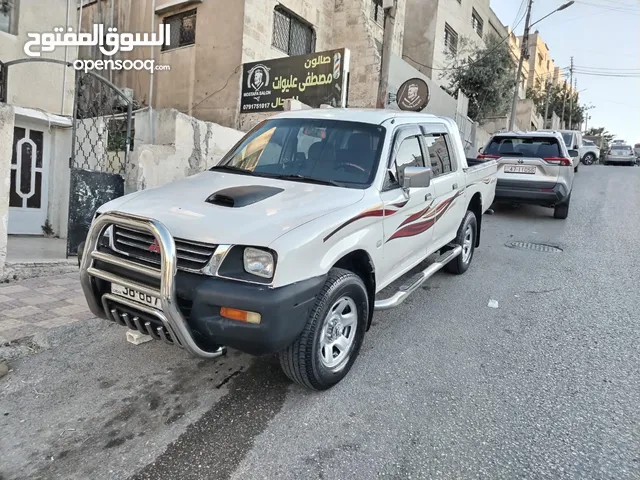 ميتسوبيشي ماغنوم 2003