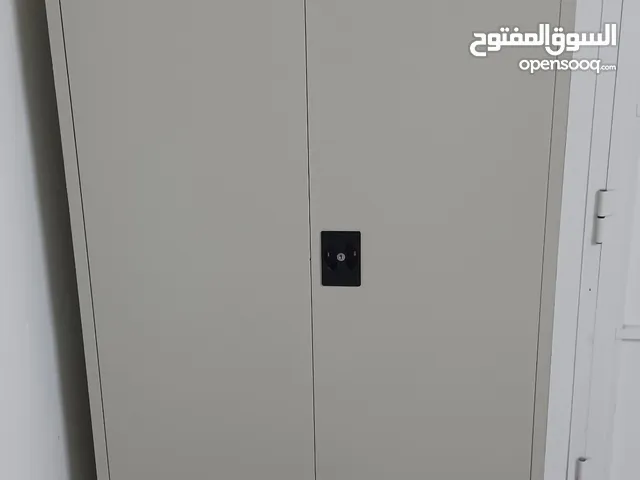 2 door steel cabinet 15 Oman riyal and 1tv cabinet 8 Oman riyal