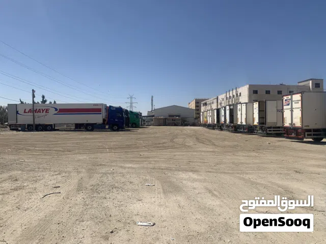 ارض تجاري معارض صناعات خفيفة بشارع الستين بسحاب للبيع المستعجل (بسعر مغري)