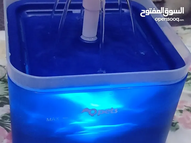 Water fountain with light and Dog poop scooper available for sale. Items are new and very useful.