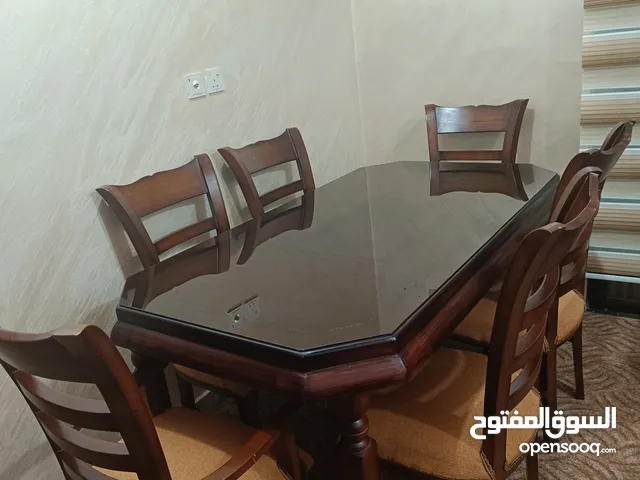 طاولة سفره خشب مع ست مقاعد