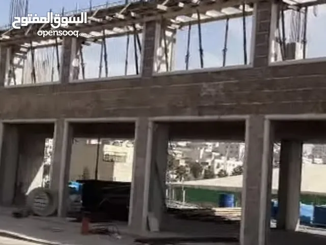 محلات عدد 2 عند دوار العلم الشارع الجديد