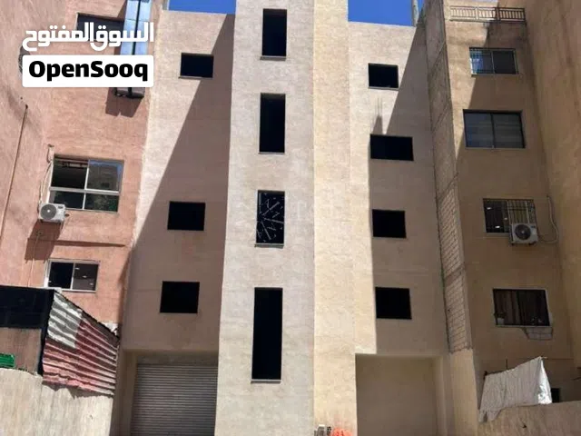 مجمع تجاري للايجار في السلط على شارع رئيسي / شارع الشجرة