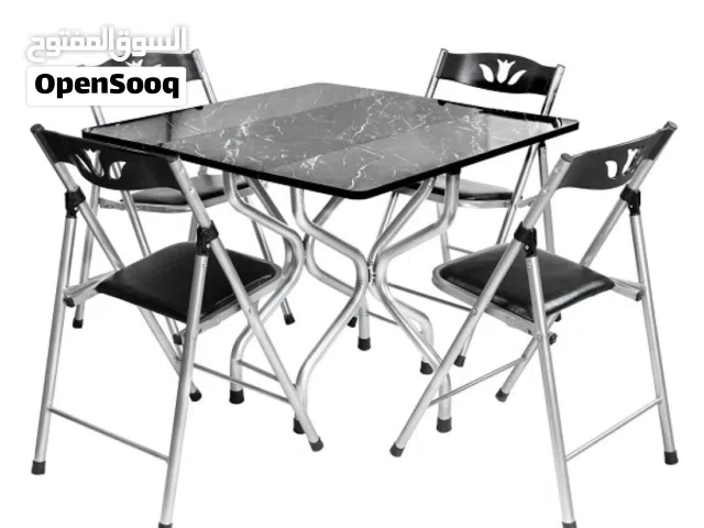 طاولة طعام خارجية مع 4 كراسي