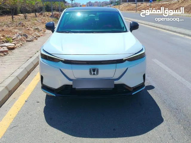 بيع مستعجل - هوندا 2022 e3 فحص كامل بحالة الوكالة بدون حوادث لم تعمل تطبيقات نهائيا لون أبيض لؤلؤي