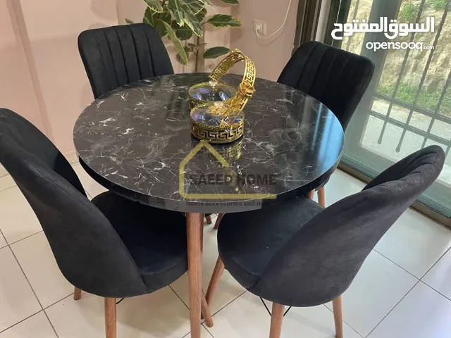 طاولة سفرة دائرية مع 4 كراسي سطح الطاولة خشب ملبس فورمايكا – مقاوم للخدوش وسهل التنظيف
