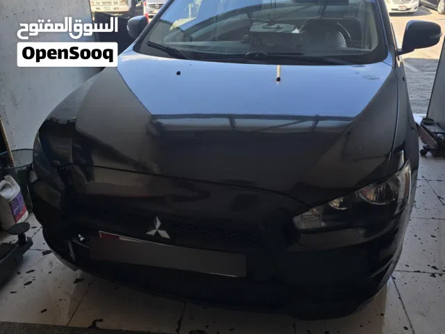 ميتسوبيشي لانسر موديل 2015 ملكيه سنه ابو ظبي