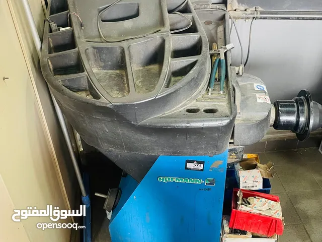 Tire balancing machine & tire changer