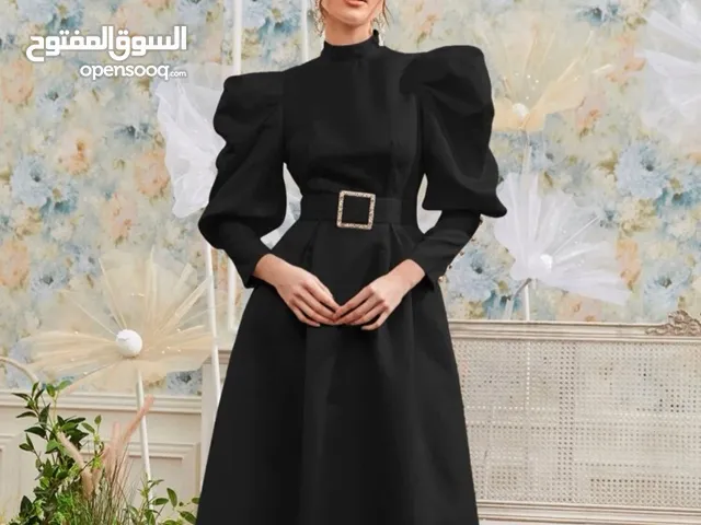 فستان أسود للمحجبات خامته حرير فساتين