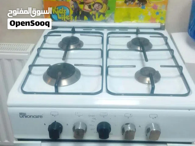 غاز يونيون إير 4 عيون + فرن نظيف جداً للبيع بسعر مغري