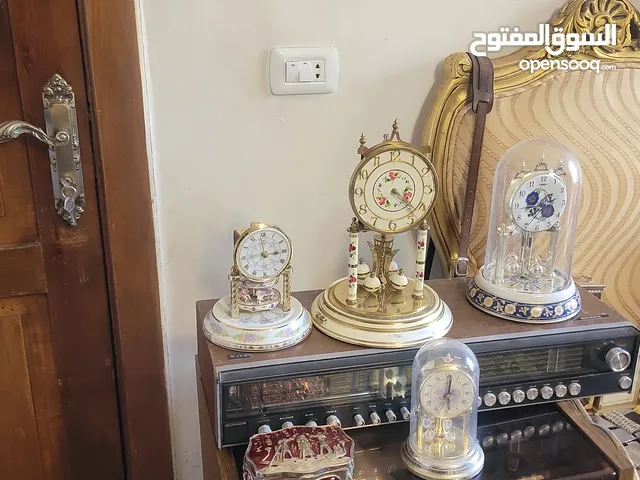 ساعات منزليه ومكتبيه قديمه