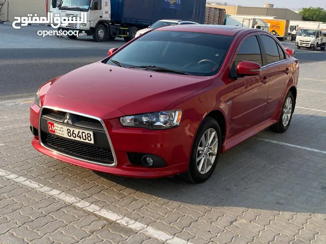 Mitsubishi Lancer... Model 2015...gcc specifications... Super clean