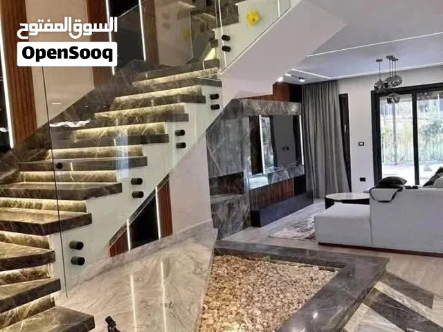 فيلا ارضي واول وروف للبيع متشطبه في كمبوند طلاله التقسيط علي 15 سنه خصم الكاش 64% في هليوبولس