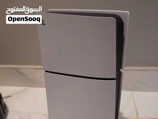 Sony Playstation 5 + 2 conrols (alpine green and standard) + active Jarir platinum extended protecti