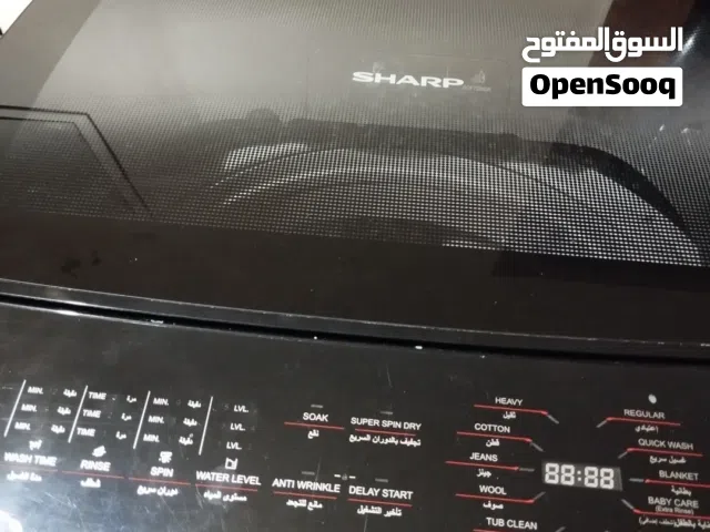 غساله شارب13كيلو شبه جديده في الضمان باقي من الضمان 4سنوات تقريبا الغساله بالتحمع