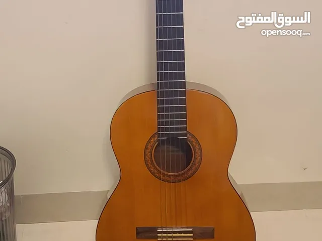 Yamaha Classic Guitar with case and Extra strings