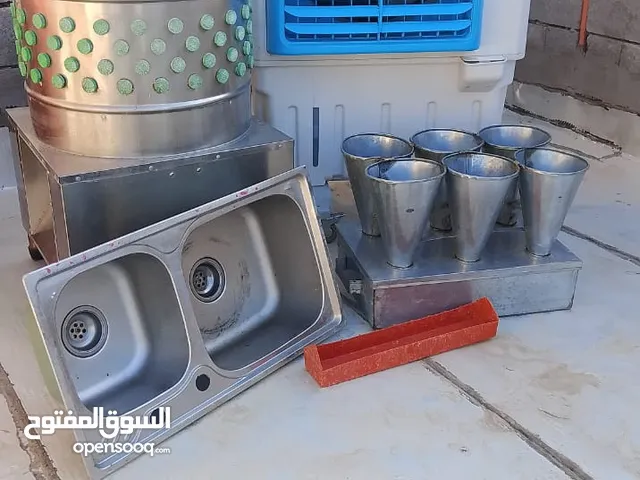 ادوات محل لبيع الدجاج الذبح