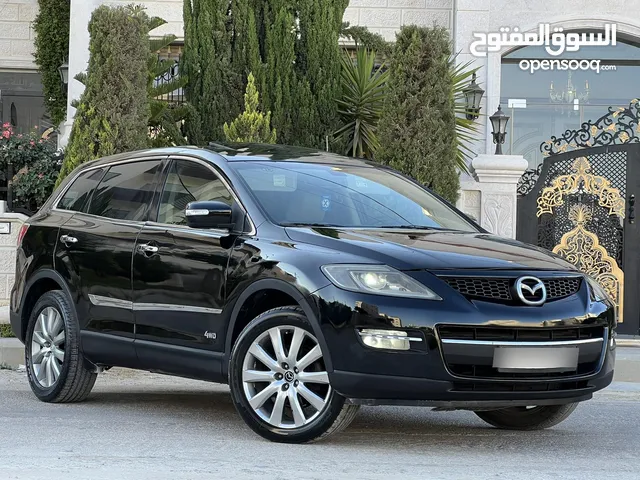مازدا 7 ركاب بحالة الوكالة 2009 و بسعر مغري