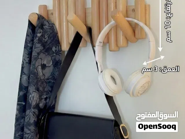 تعلاكة ملابس خشب مودرن بتصميم أنيق وعصري