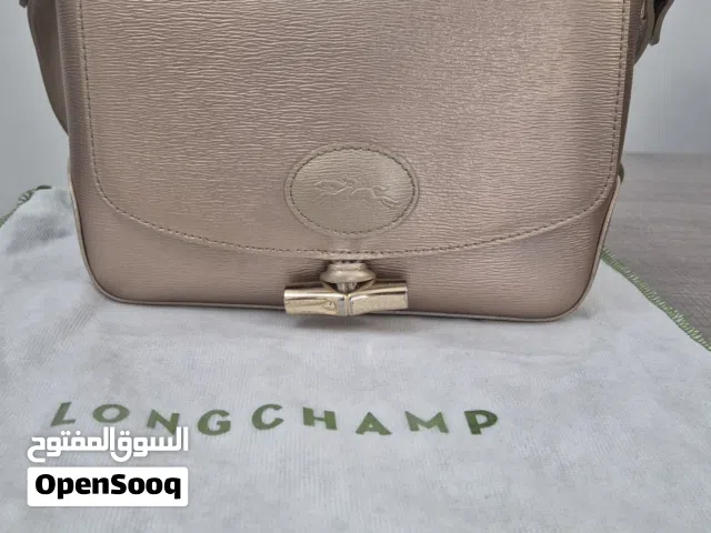 longchamp bag: Excellent condition, Golden color , leather