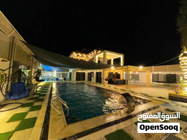 شاليه مميز للإيجار اليومي بركة مدفية وبناء حديث وأثاث جديد وموقع مميز بافضل الأسعار