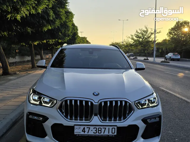 BMW X6 X DRIVE 400i 2022بحالة الوكالة