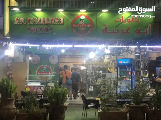 محل حلويات كامل في العقبة للبيع بخلو  ايجار منخفض وسط البلد دخلة علي بابا