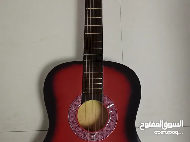 جيتار مع شنتته وريشة وخيط احطياتي للبيع