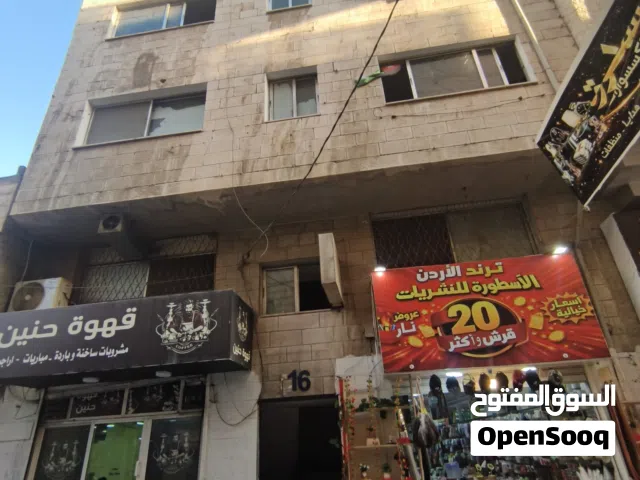 عمارة للبيع جرش - وسط السوق التجاري