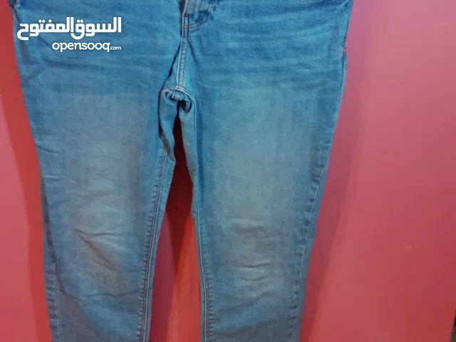 جينز ضيق بخصر متوسط. . .