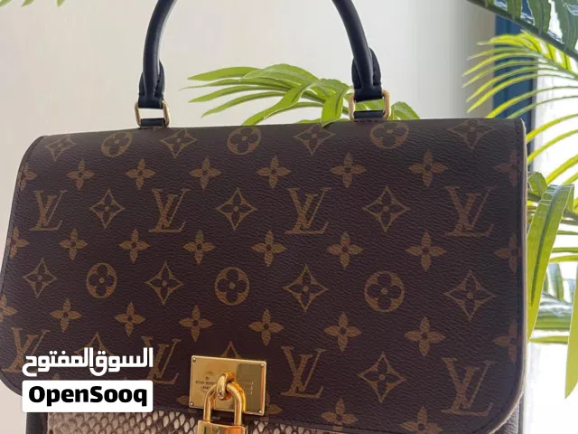 Beige Louis Vuitton for sale  in Hawally