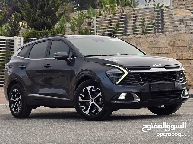 كيا سبورتاج هايبرد 2023 / فل كامل مع بانوراما وفرش مميز غرفه عسليه / عداد قليل / سعررر مميز جداً