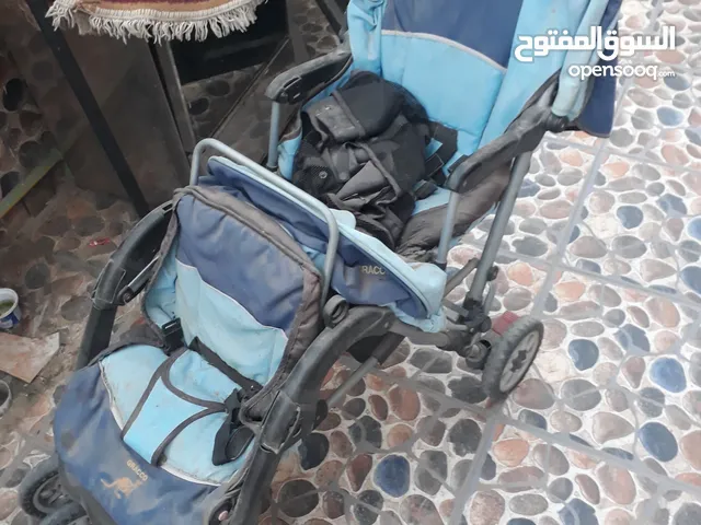 عربة اطفال تؤام وارد السعودية مستعمله سليمه 100%