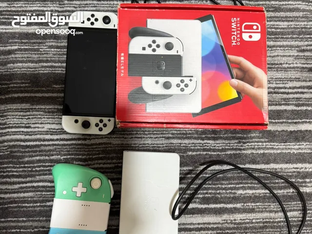 Nintendo switch OLED مع العاب بقيمة فوق ال 115 دينار